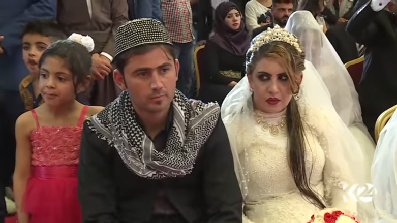 بالصور.. اربيل تحتضن عرسا جماعيا لـ 214 شابا وشابة